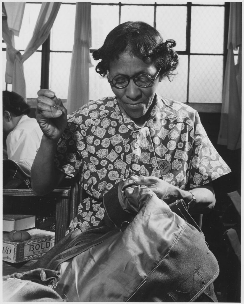 Women workers at quartermaster depot. The nimble fingers of many American women are now contributing to the war... - NARA - 535808.tif