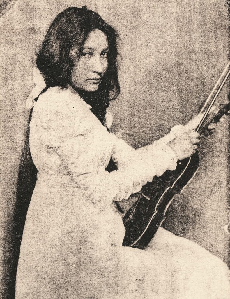 In addition to photographing the Sioux performers sent by Buffalo Bill Cody to her studio, Käsebier was able to arrange a portrait session with Zitkala Sa, "Red Bird," also known a